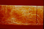 Assyrian hunting scenes, horseman distracting a lion by James Doan