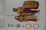 A British lady and warrior equippd with items found in the Queen's Barrow sores and at Grimthorpe. Some of the lady's jewlry is showing in detail on the left by James Doan