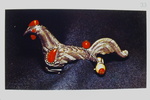 Bronze brooch in the form of a cock, from the Princess' grave at Reinheim- from die Keltenin mitteleuropa by James Doan
