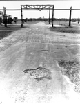 Road with Potholes by Courtesy of the Naval Air Station Fort Lauderdale Museum