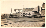 Wooden Plane on the Dock Next to the USS Heron by Courtesy of the Naval Air Station Fort Lauderdale Museum
