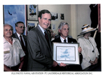 Allen McElhiney Presents President Bush with A Certificate by Courtesy of the Naval Air Station Fort Lauderdale Museum