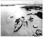 Capsized ship by Courtesy of the Naval Air Station Fort Lauderdale Museum