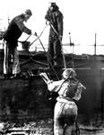 Sailors Pulling Up a Diver by Courtesy of the Naval Air Station Fort Lauderdale Museum